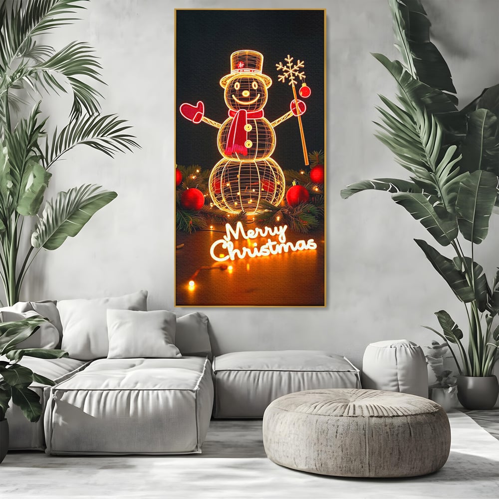 Tablou canvas cu ilustratie cu om de zapada luminos, in rama de aluminiu auriu, pe perete intr-un living